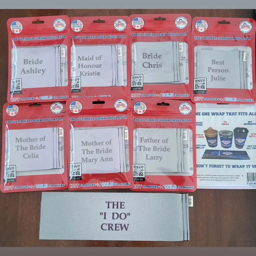 Packaged wedding roles with personalized names on a wooden surface, branded 'TUDI WRAPS' and 'weddingfairab'.